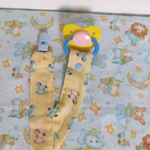 Pacifier with rocking horse clip