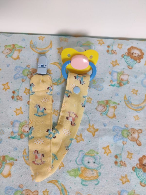 Pacifier with rocking horse clip