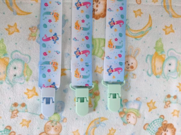 Mermaids pacifier clip