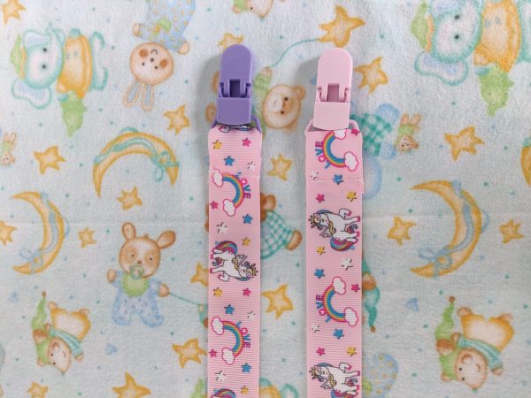 Pink unicorns pacifier clip